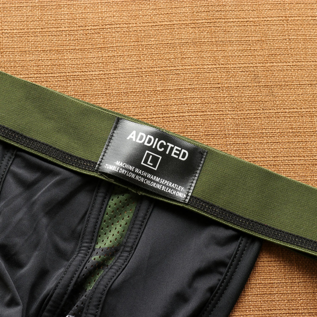 New men's milk mesh hole splicing low waist underwear independent bag elastic fashion trend double tee